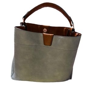 Denim and brown vegan leather handbag